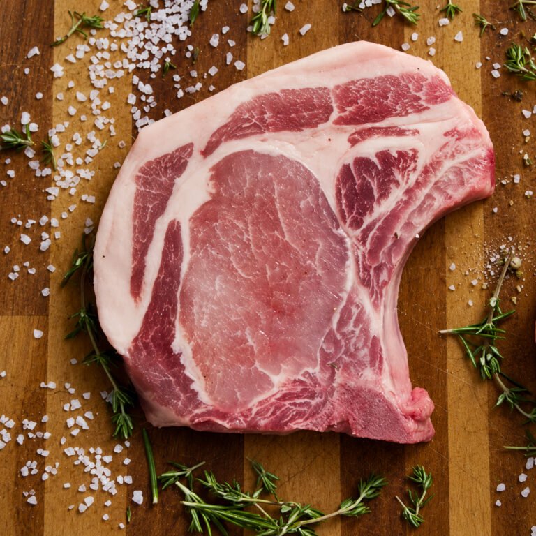 Rustic Rosemary Pork Chop on Butcher Block